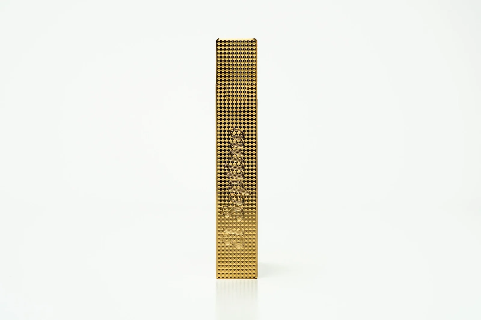 luxury cigar lighters featuring a diamond head guilloche pattern.